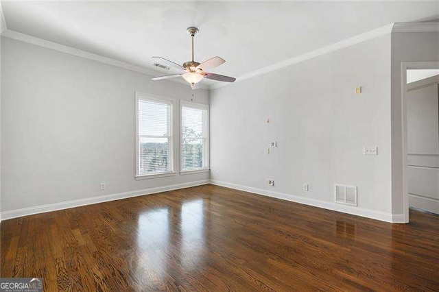 unfurnished room featuring dark hardwood / wood-style floors, ceiling fan, and crown molding