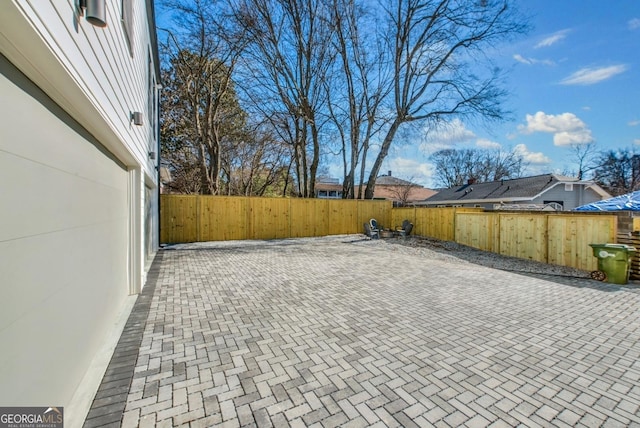 view of patio with a fenced backyard