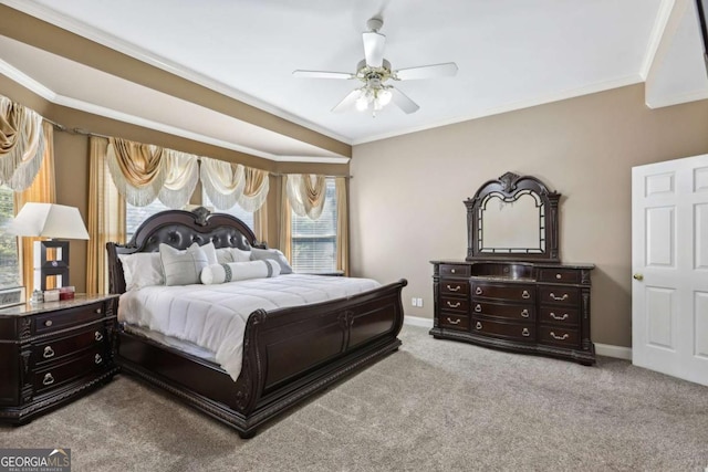 bedroom with ceiling fan, carpet floors, and ornamental molding