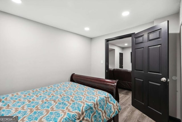 bedroom featuring light hardwood / wood-style floors