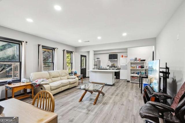 living room with light hardwood / wood-style flooring