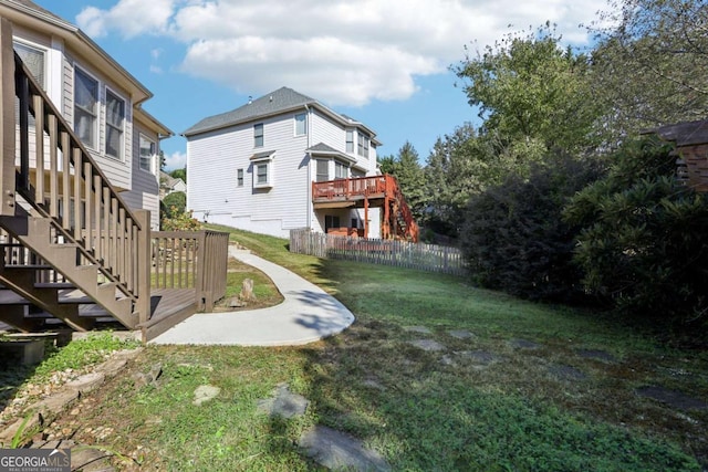 view of yard with a wooden deck