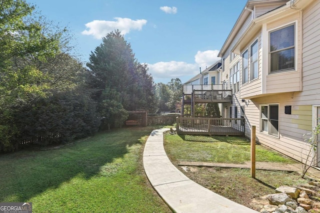 view of yard with a deck