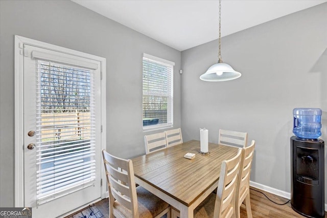 11945 Lovejoy Crossing Way, Hampton, GA 30228 - dining space featuring wood finished floors and baseboards