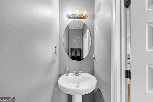 11945 Lovejoy Crossing Way, Hampton, GA 30228 - bathroom featuring a sink