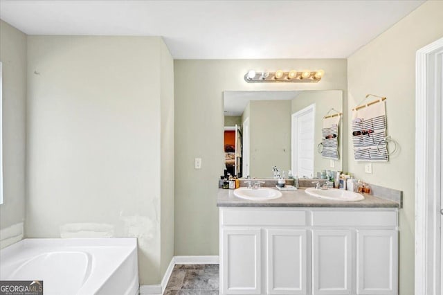 11945 Lovejoy Crossing Way, Hampton, GA 30228 - bathroom with double vanity and a bath