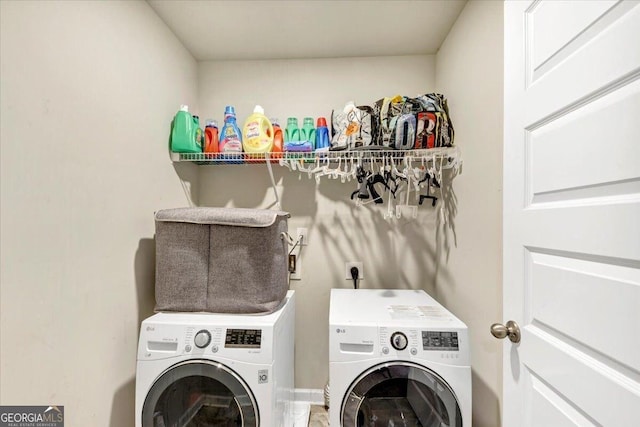 laundry room featuring washer and clothes dryer