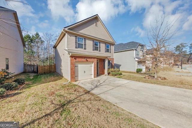 view of front of property featuring a garage and a front lawn