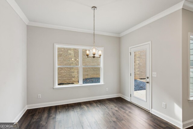 spare room featuring a raised ceiling, ornamental molding, carpet flooring, and ceiling fan