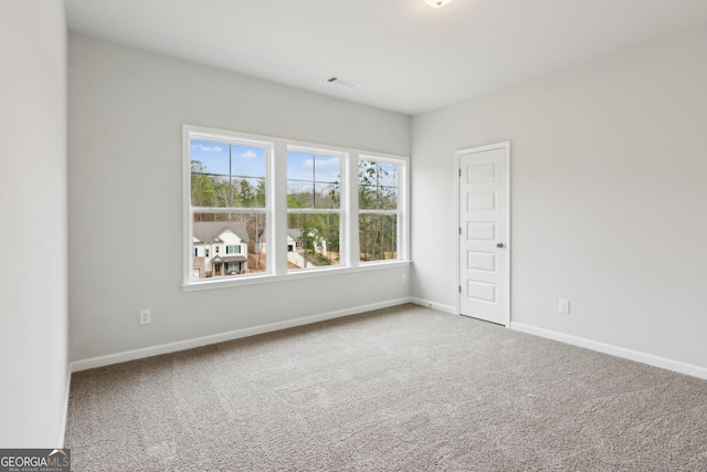 view of carpeted spare room