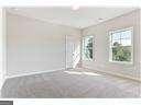 unfurnished room featuring concrete floors