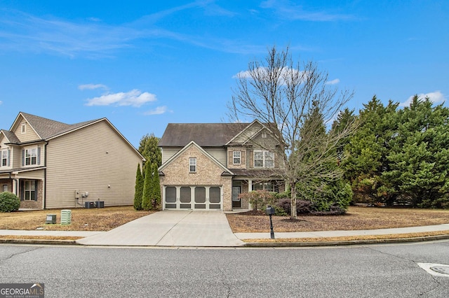 view of front of property featuring a garage