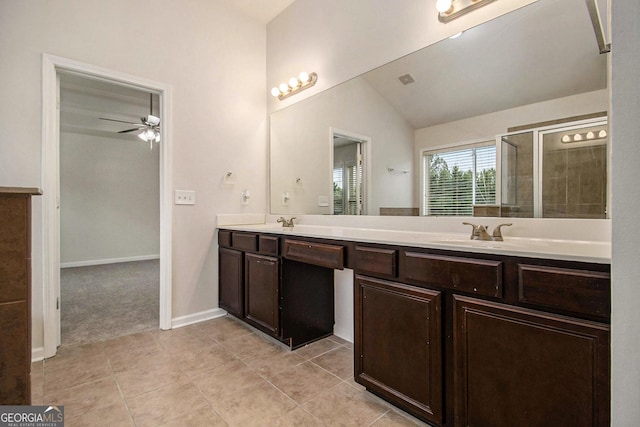 bathroom with an enclosed shower, vanity, ceiling fan, tile patterned flooring, and lofted ceiling