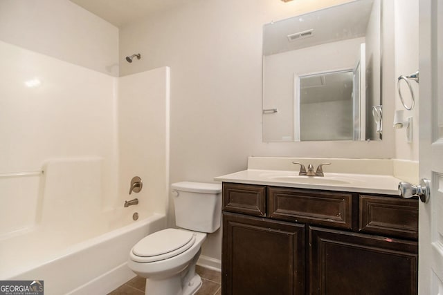 full bathroom with shower / tub combination, tile patterned floors, vanity, and toilet