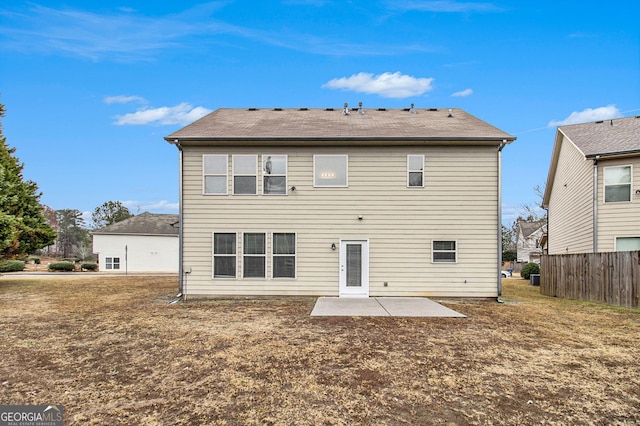 rear view of property with a patio area