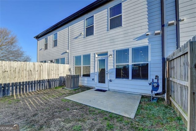 back of property featuring a patio area and central AC unit