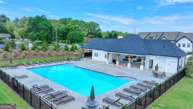 view of swimming pool with a patio