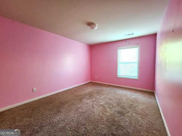 view of carpeted spare room