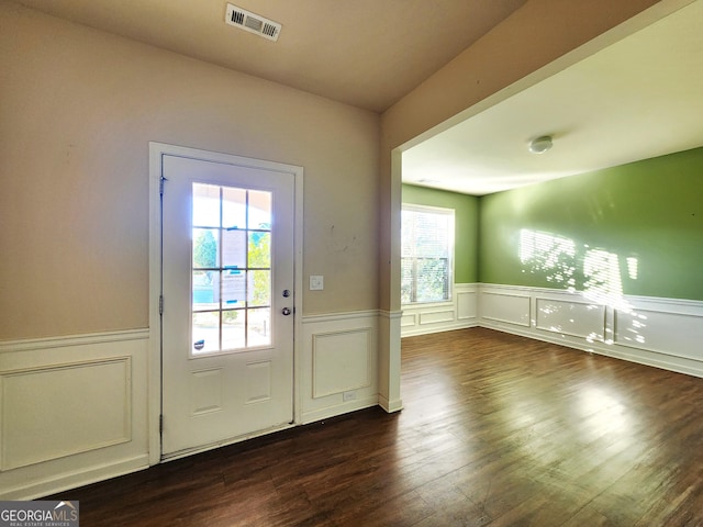 entryway with dark wood-type flooring