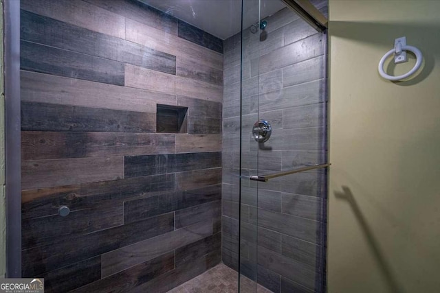 bathroom featuring an enclosed shower