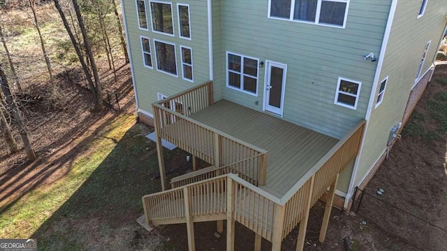 back of property with a deck