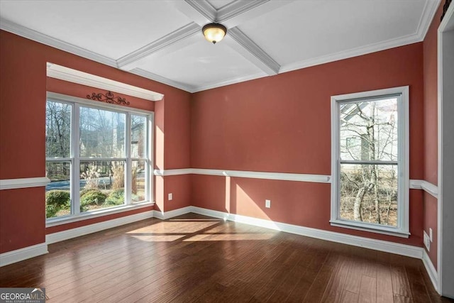 spare room featuring crown molding, hardwood / wood-style floors, beamed ceiling, and coffered ceiling