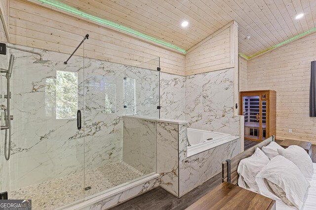 bathroom featuring wood ceiling, wood-type flooring, lofted ceiling, and plus walk in shower