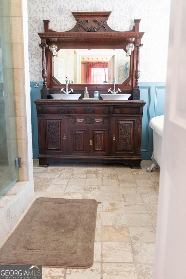 bathroom featuring vanity and walk in shower