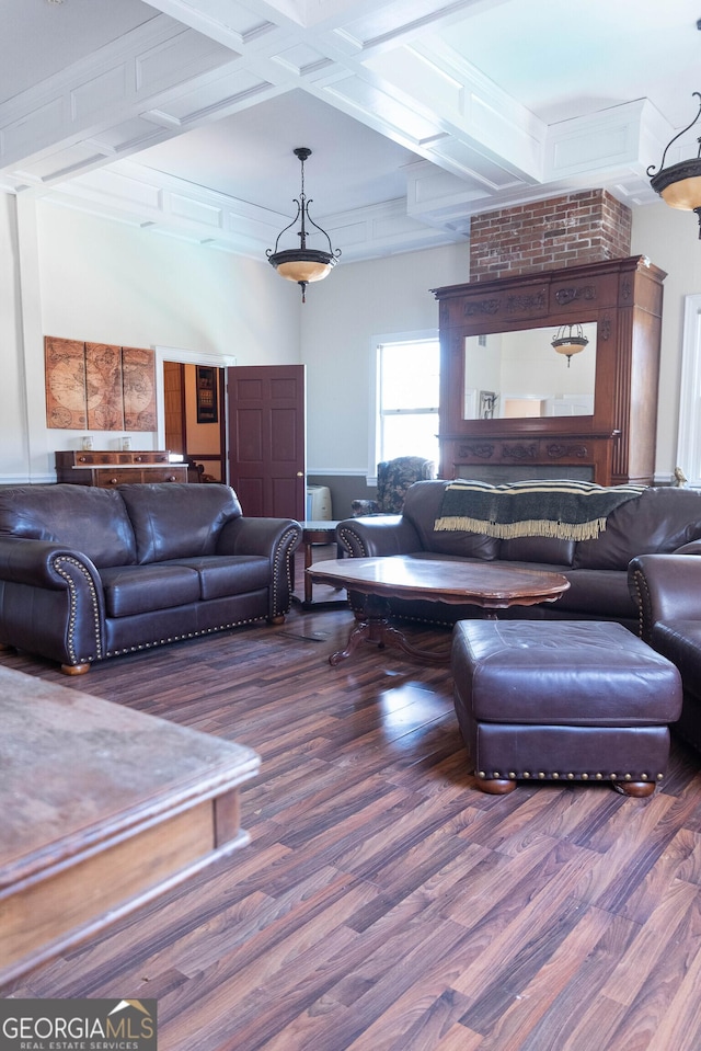 living room featuring hardwood / wood-style flooring, beam ceiling, and coffered ceiling