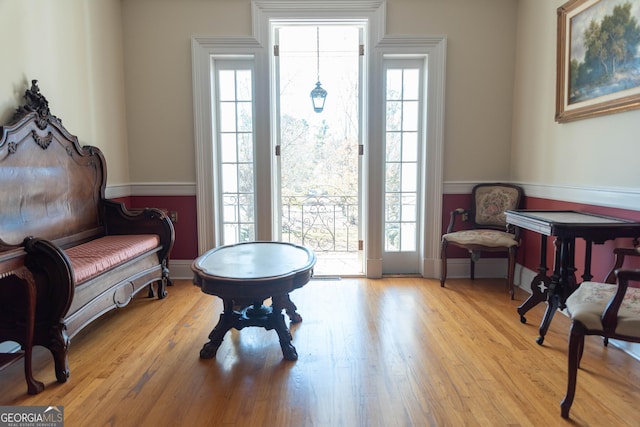 sitting room featuring light hardwood / wood-style flooring