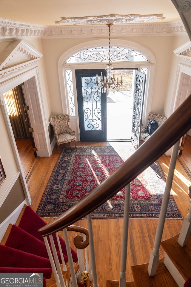 entrance foyer featuring hardwood / wood-style floors and plenty of natural light