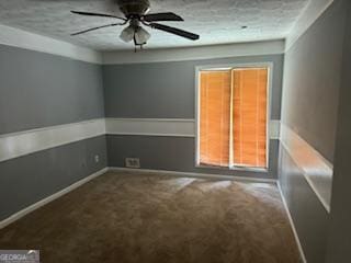 empty room featuring ceiling fan and carpet floors