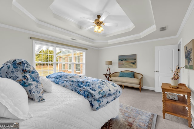 bedroom featuring light carpet, a raised ceiling, ceiling fan, and crown molding