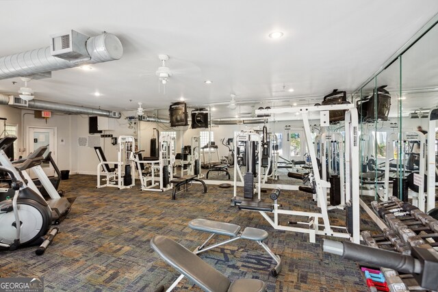 gym featuring carpet flooring and ceiling fan