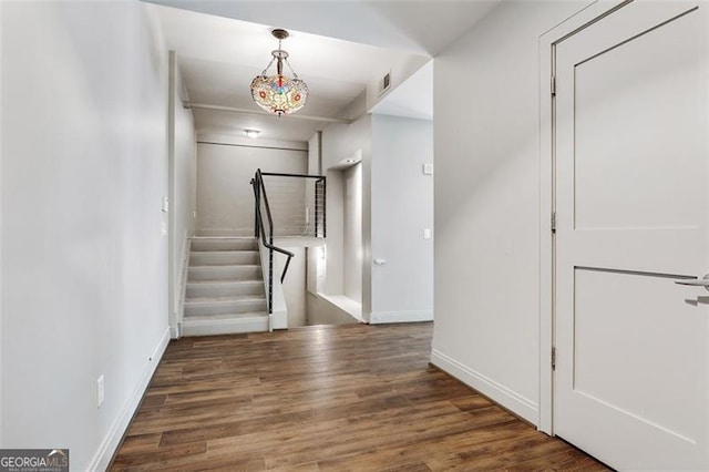 hallway featuring dark hardwood / wood-style floors