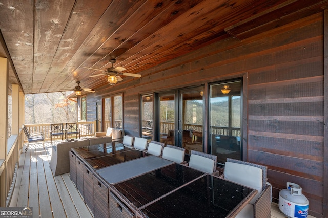 wooden terrace with ceiling fan