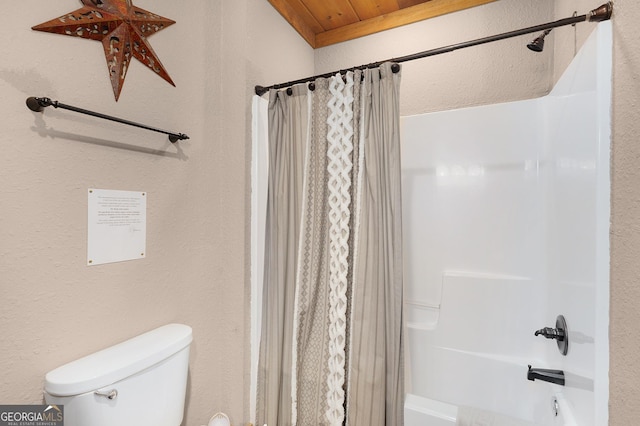 bathroom with toilet, wooden ceiling, and shower / tub combo with curtain