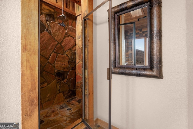 bathroom featuring walk in shower