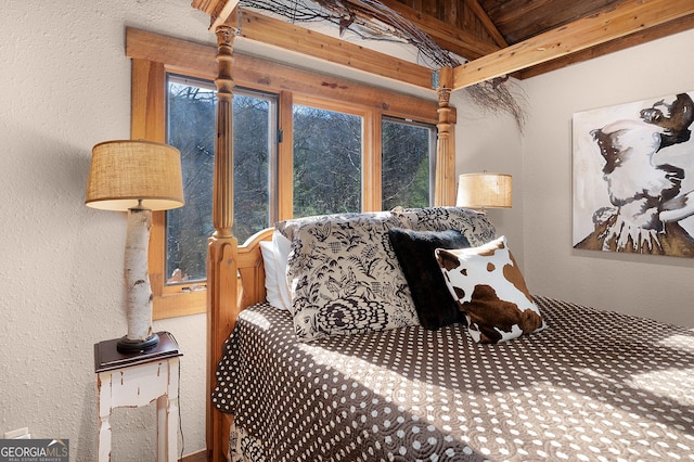 bedroom featuring vaulted ceiling