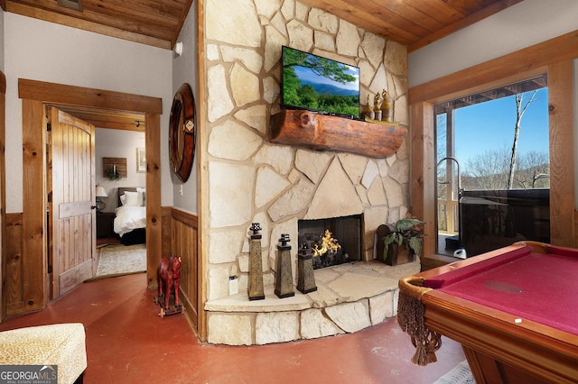 living room featuring a fireplace, concrete floors, billiards, and wood ceiling