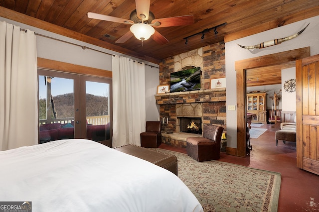 bedroom featuring access to exterior, ceiling fan, french doors, and wood ceiling