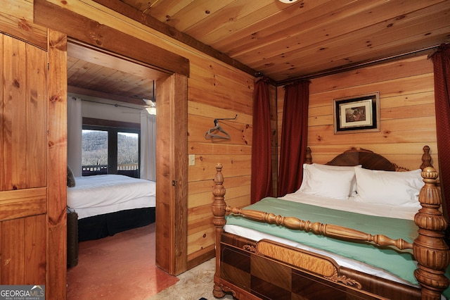 carpeted bedroom with wood ceiling and wooden walls