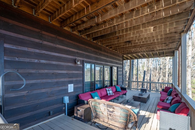 deck featuring an outdoor living space