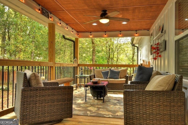 deck with ceiling fan and an outdoor hangout area