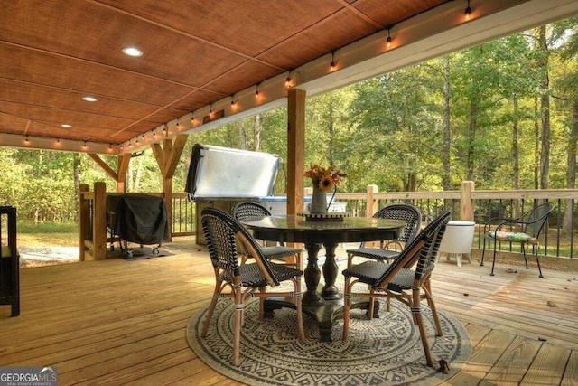 wooden deck featuring grilling area