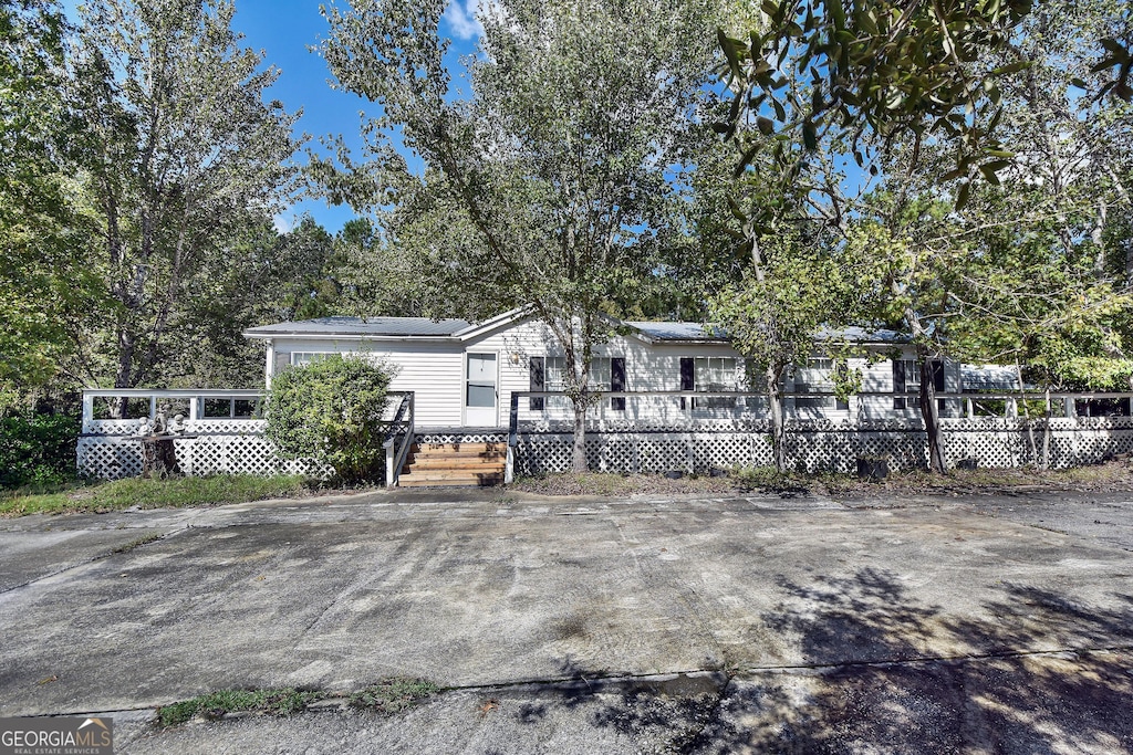 view of front of house featuring a deck