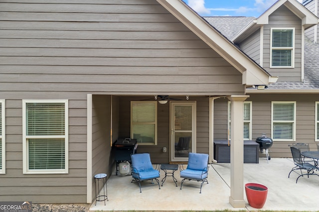 view of patio featuring ceiling fan and grilling area