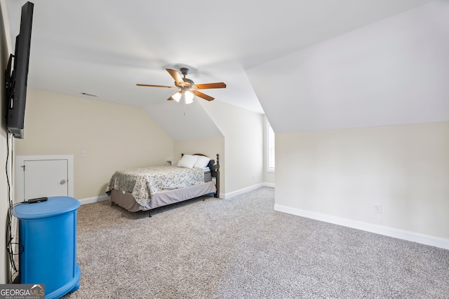 bedroom with carpet flooring, ceiling fan, and vaulted ceiling