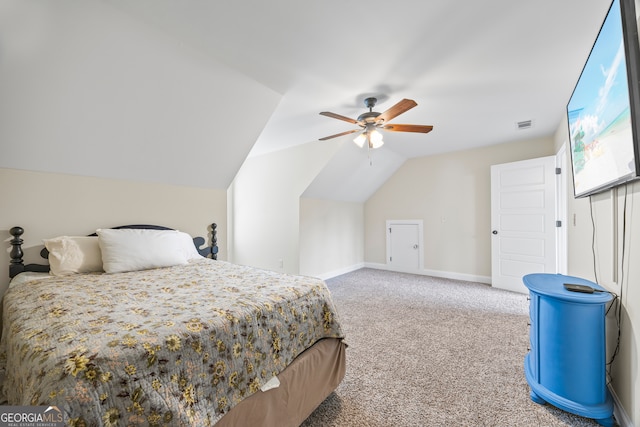 bedroom with carpet, ceiling fan, and lofted ceiling