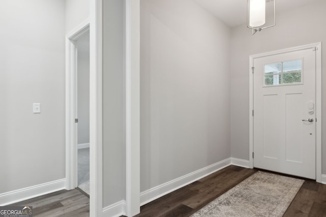 entryway featuring dark wood-type flooring